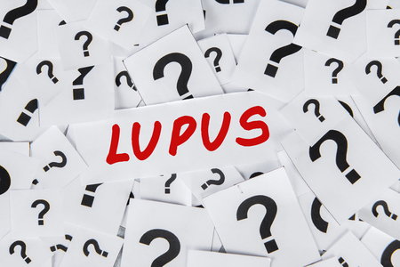 75613647 - close up of question marks and lupus word. concept of lupus disease
